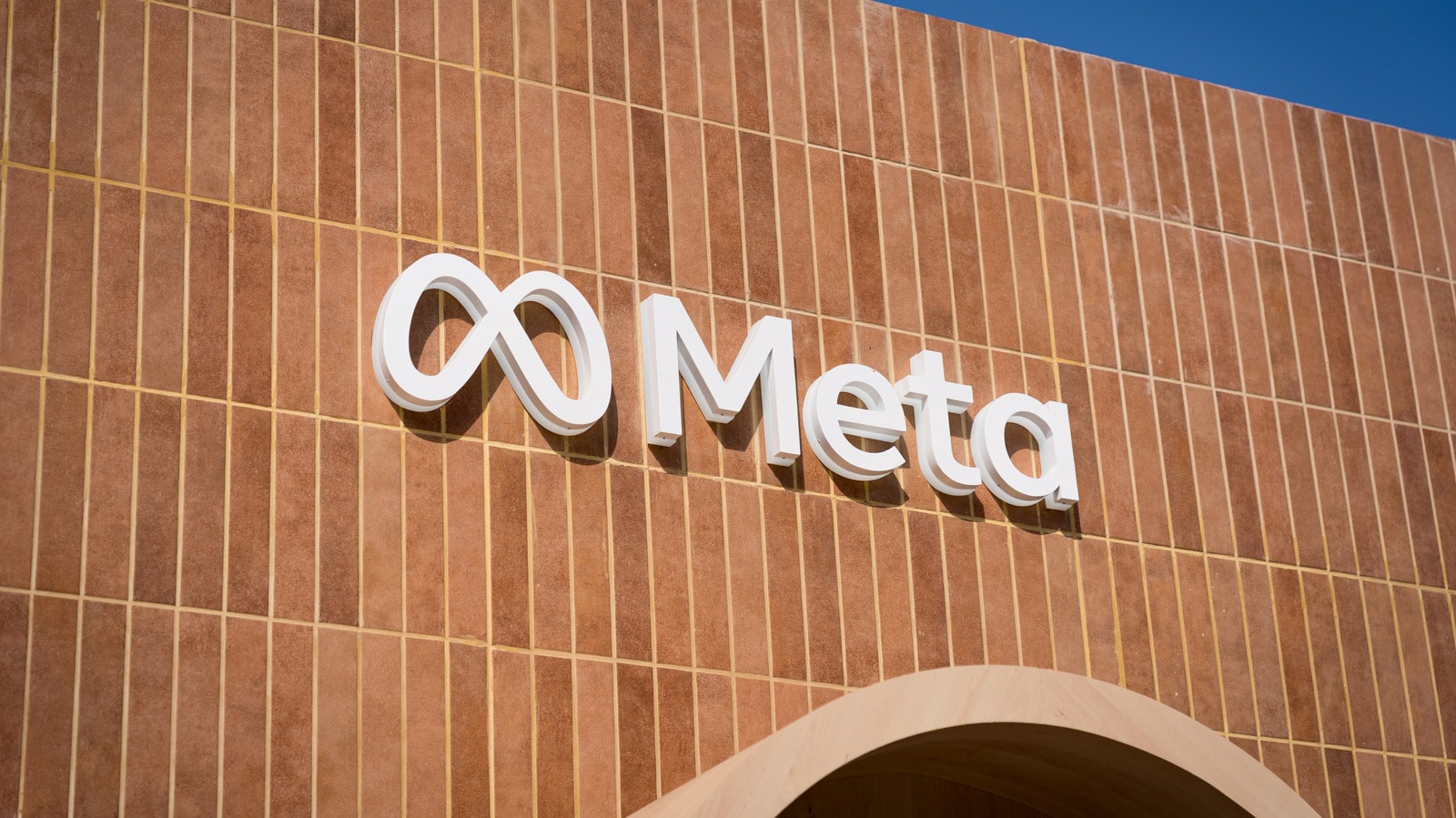 Meta logo displayed on a digital screen